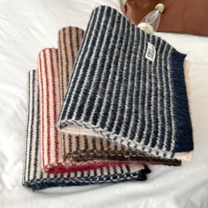 Cozy striped knitted scarf for women, thick warm winter neck warmer with stylish multi-color design.