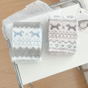 Cozy Fair Isle knitted scarf for women, soft fuzzy winter neckerchief with cute dog pattern.