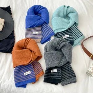 Cozy winter knit scarf for women, thick warm woolen neck warmer with stylish striped design.