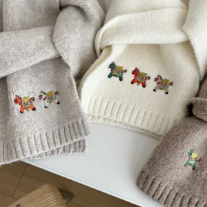 Knit scarf with cute horse embroidery, soft warm solid color winter neckerchief detail.