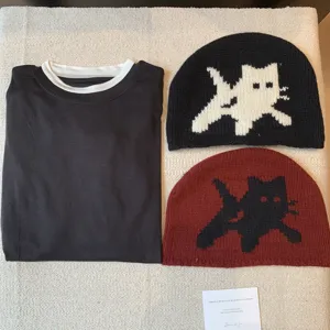 Knit beanie hat set with cat graphic and long sleeve t-shirt detail for women autumn winter.