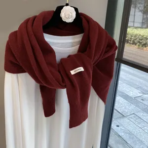 Merino wool knit shawl scarf in dark red, elegant draped detail for women layering stylish.