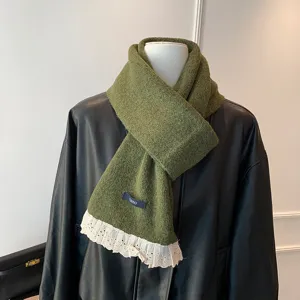 Dark green knitted scarf with white lace trim, cozy autumn winter warm fashion neck warmer.