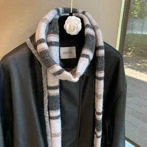 Cozy striped knitted scarf for women, stylish long narrow design, winter daily wear.