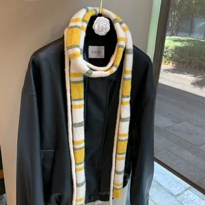 Striped narrow wool scarf for women, chic knit baguette neck warmer, stylish winter accessory.