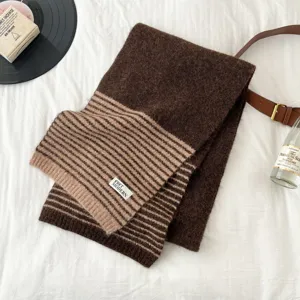 Brown striped knit scarf detail, cozy winter neck warmer with stylish textured stripe design.