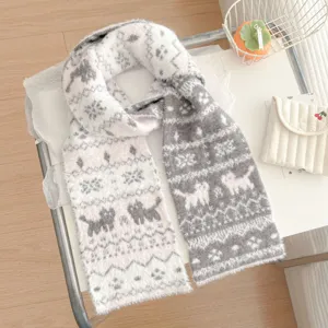 Detailed shot of fluffy knit scarf featuring cute cat patterns and classic winter Fair Isle design.