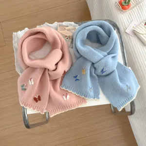 Cozy pink and blue knitted winter scarves featuring cute 3D butterfly embroidery designs.