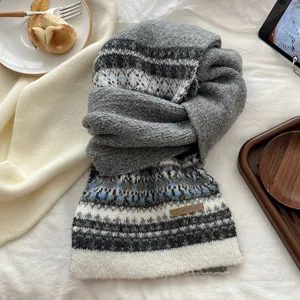 Cozy grey fair isle knit winter scarf for women, thick warm chunky neck warmer casual apparel.