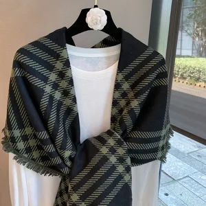 Classic black plaid winter scarf with chic fringe details, warm knit shawl for women.