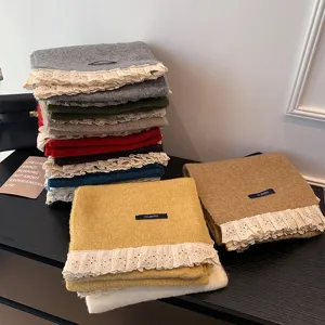 Detailed view of winter warm scarves with sweet lace trim, multi-color stacked display.
