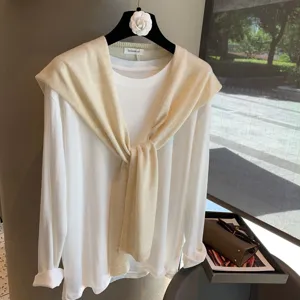 Korean minimalist solid color long sleeve t-shirt with draped knitted shawl for elegant daily wear.