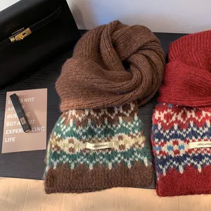 Cozy Fair Isle knit scarf detail, thick warm winter neck wrap with chic retro geometric pattern.