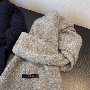 Cozy thick winter knitted scarf for men and women, warm and soft daily wear accessory.