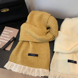 Cozy knit scarf with delicate lace fringe detail, soft winter warm neck wrap accessory.