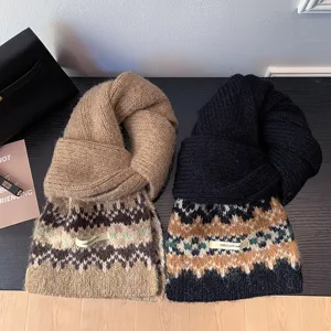 Cozy Fair Isle knit scarf for women, thick and warm winter accessory with patterned design.