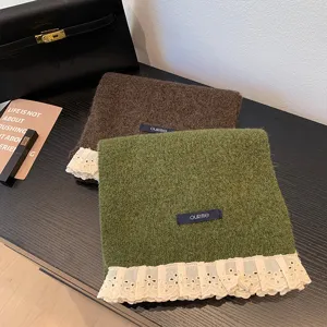 Cozy winter knit scarf with delicate lace fringe, stylish warm neck wrap for women.