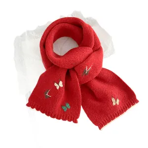 Red knitted winter scarf featuring 3D butterfly embroidery, cozy thick neck warmer.