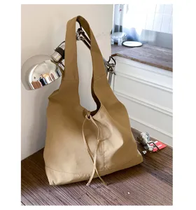 Casual canvas shoulder bag for women, large capacity stylish daily tote with drawstring.