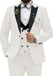 Detailed view of white three-piece suit jacket, black peak lapel and double-breasted vest.