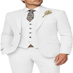 White mens three piece suit detail view featuring a stylish paisley patterned tie and vest