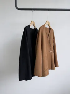 Women's short double-faced wool blend coat with stylish V-neck wrap and chic waist belt.