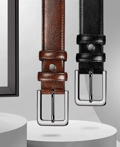Detailed view of men's leather belts in brown and black with stylish metal pin buckles.
