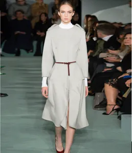 Minimalist genuine leather thin belt detail, elegant brown leather strap for dresses and coats.