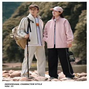 Couple outdoor waterproof jacket and pants set, stylish hiking sportswear for men and women.