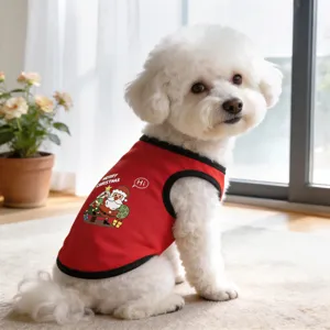 Detailed view of a cute white dog wearing a red Christmas pet vest, breathable and cozy daily wear.