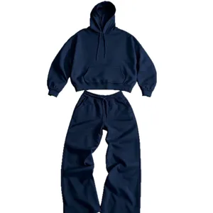Damen lässiger lockerer dunkelblauer Kapuzenpullover und weite Jogginghose Set.