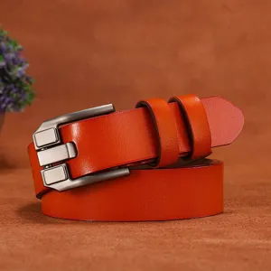 Women genuine leather belt detail view featuring orange cowhide texture and unique metal buckle.