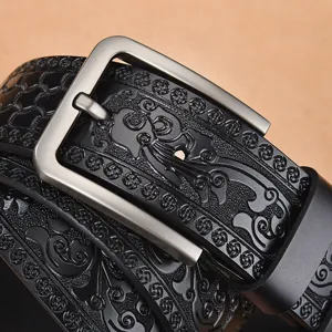 Men's vintage embossed leather belt featuring a classic pin buckle and retro patterns.