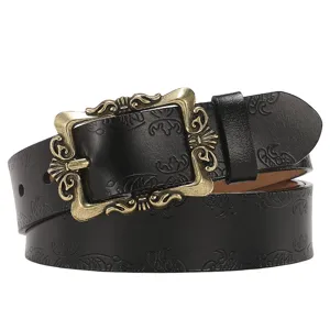 Women vintage genuine leather belt with ornate retro metal pin buckle for casual jeans.