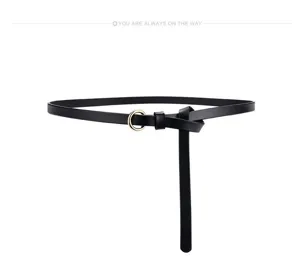 Minimalist women's genuine leather thin belt with metal round buckle, versatile dress belt.