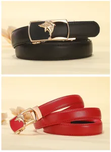 Detailed view of women genuine leather belt with elegant golden dolphin automatic metal buckle.