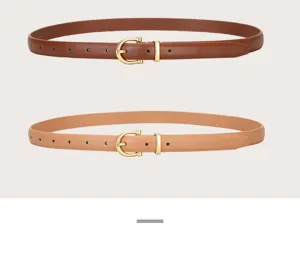 Elegant women's leather belt with gold horseshoe buckle, minimalist style for jeans and dresses.