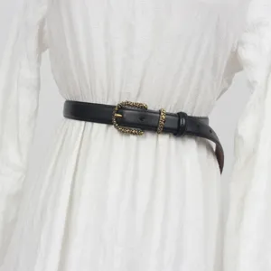 Black leather belt for women, vintage brass buckle, stylish thin waistband for jeans dress.