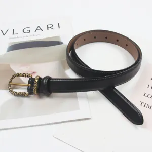 Black leather belt for women with vintage metal buckle, stylish thin waist strap for jeans.