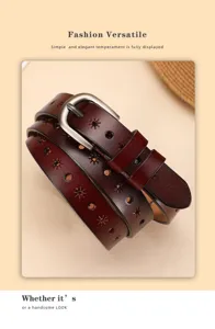 Close-up detail of women genuine leather belt with star cutouts and metal pin buckle design.