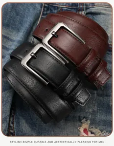 Close-up detail of men's genuine leather belts in black and brown with classic pin buckles.