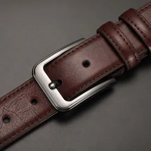 Men brown genuine leather belt with stylish silver pin buckle, classic business accessory.