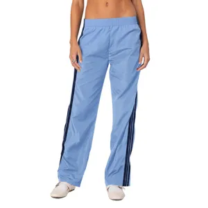 Pantaloni da tuta larghi azzurro chiaro da donna con bande laterali, pantaloni sportivi casual.