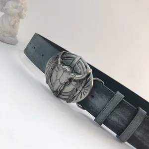 Western retro bull skull metal buckle black leather belt detail showcase, vintage style accessory.