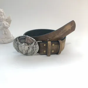 Women western vintage leather belt with bull skull buckle and distressed finish for daily styling.