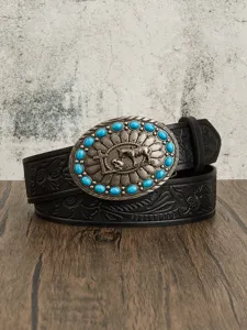 Western vintage style embossed leather belt featuring a large turquoise stone cross horse buckle.