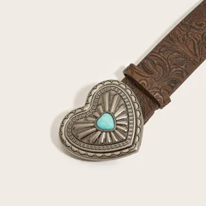 Retro western brown embossed leather belt featuring a vintage turquoise heart metal buckle.