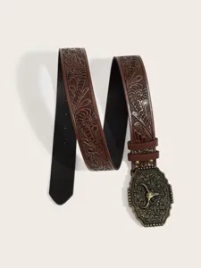 Detailed view of the western cowboy style brown PU embossed leather belt with bull skull buckle.