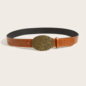 Western retro floral embossed leather belt with ornate oval metal buckle detail for fashion.