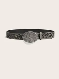 Detailed close-up of the vintage engraved oval buckle and floral embossed belt strap.